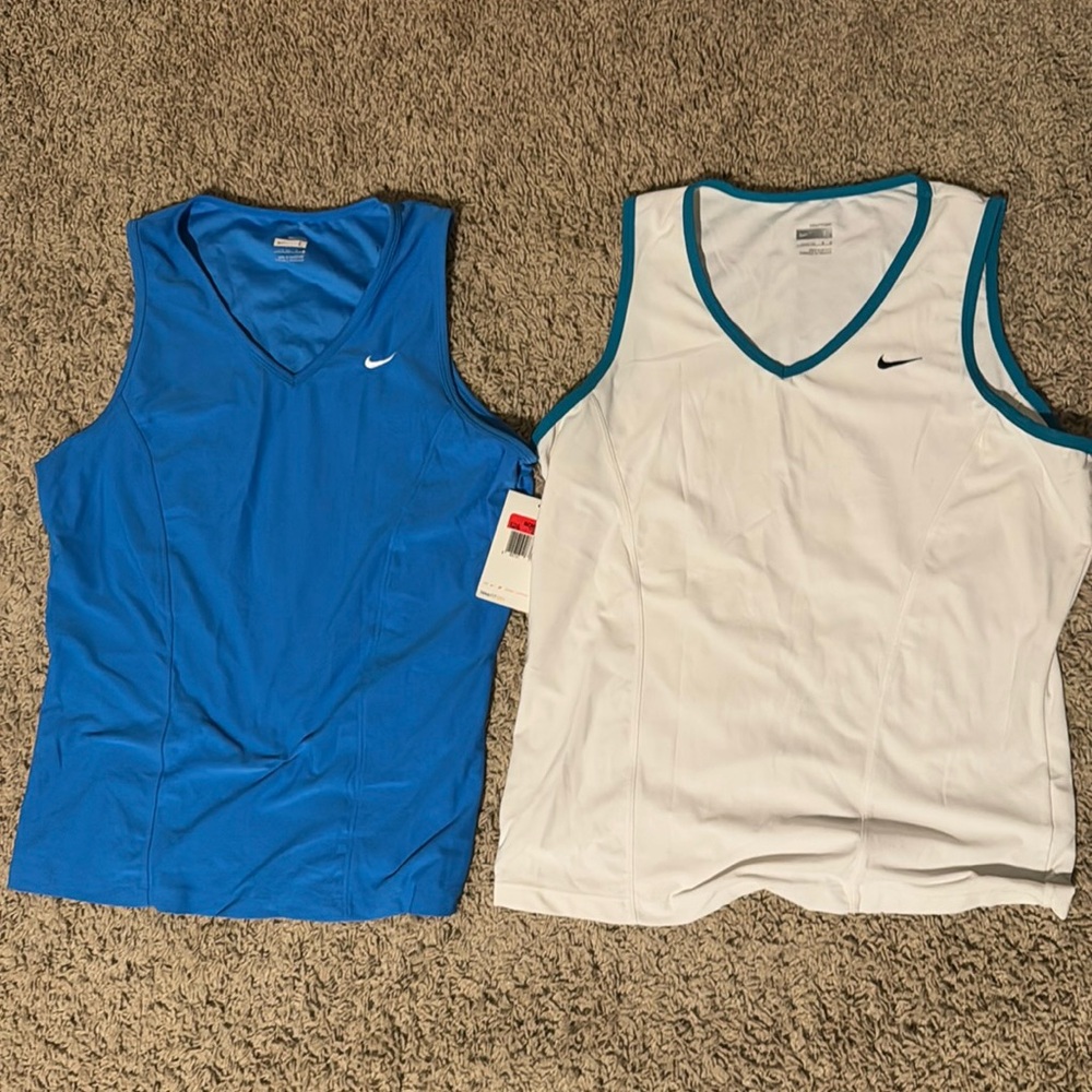 2 Nike sport tops, one is NWT, other is like new